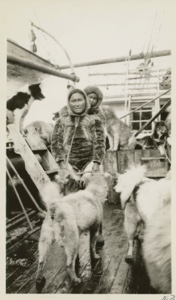 Image of Eskimo [Inughuit] woman and baby on deck of S.S. Roosevelt